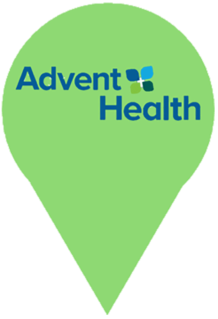 A green pin with the word advent health on it.